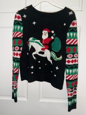 Black Holiday Santa Riding Unicorn Sweater with Red & Green Accents